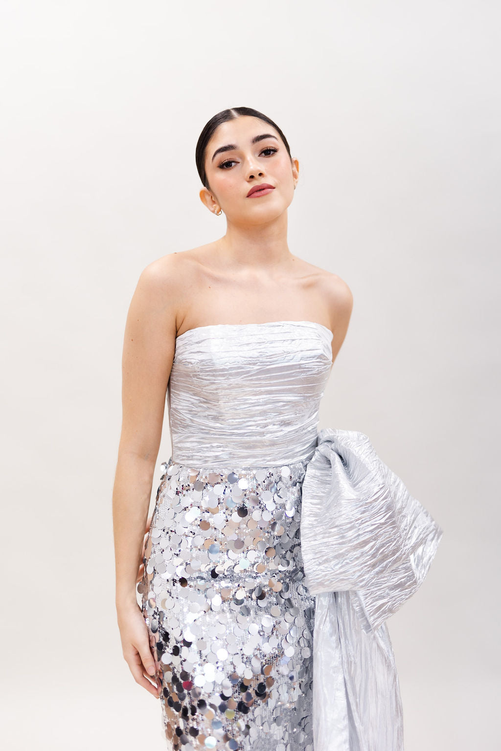 SILVER DRAPED TOP SEQUIN GOWN WITH BOW & SIDE TRAIN