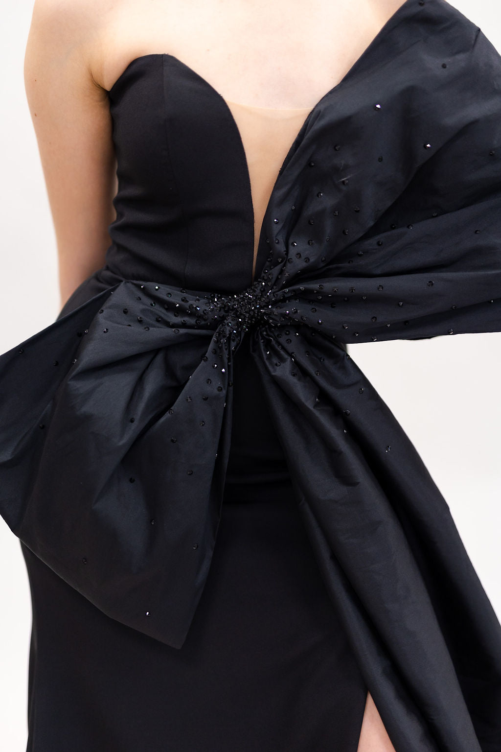 BLACK CREPE DEEP V NECK GOWN WITH BOW AND SWAROVSKI DETAILS
