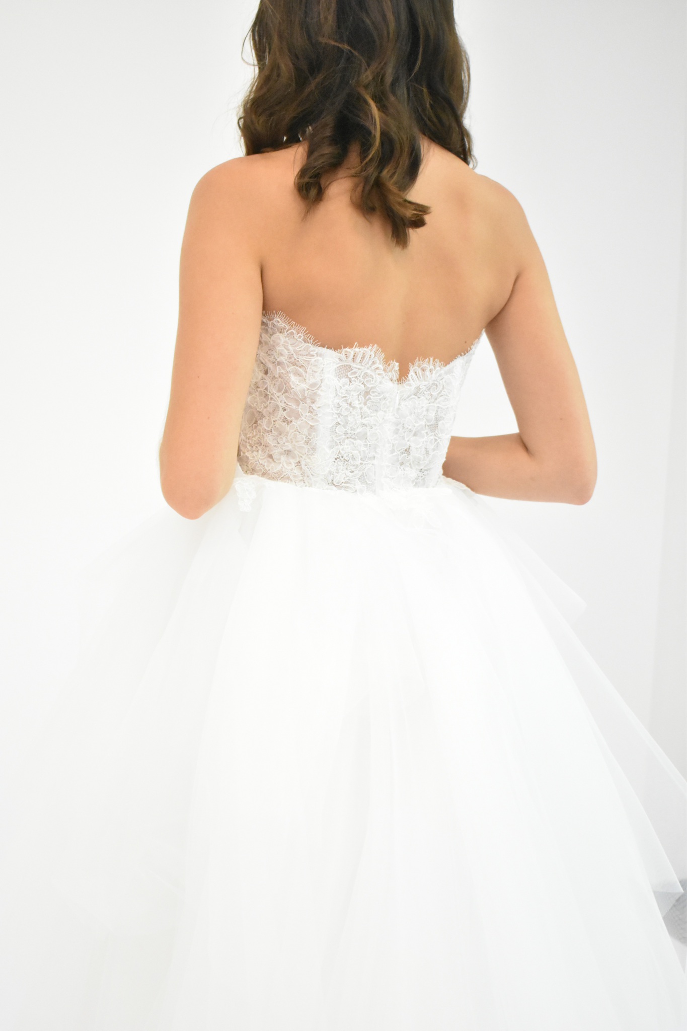 STRAPLESS LACE TOP WITH LEVELS OF TULLE BALLGOWN