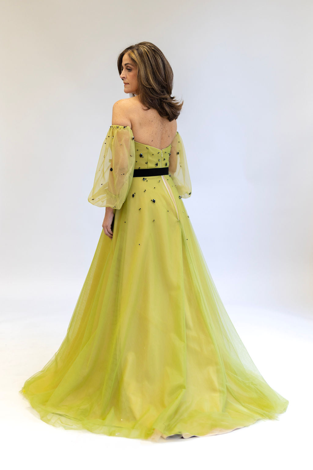 PUFFY LONG SLEEVE OLIVE GOWN WITH BLACK CRYSTALS