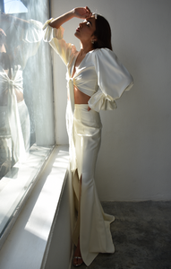 Flare pants with a twist in ivory